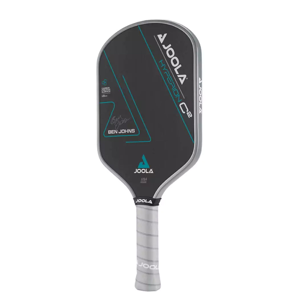 SPORT: PICKLEBALL. Shop Joola Pickleball at USA premier Racket and Paddle Sports store, "iamracketsports". Joola Ben Johns HYPERION C2 CFS 16mm Pickleball Paddle. Racquet/Paleta is vertical left rotated.  Carbon Friction surface, Reactive Polymer Core, Hyperfoam Edge Wall Weight 8oz, Grip Length 5.5", Grip size 4.125" Feel-Tec Pure Grip