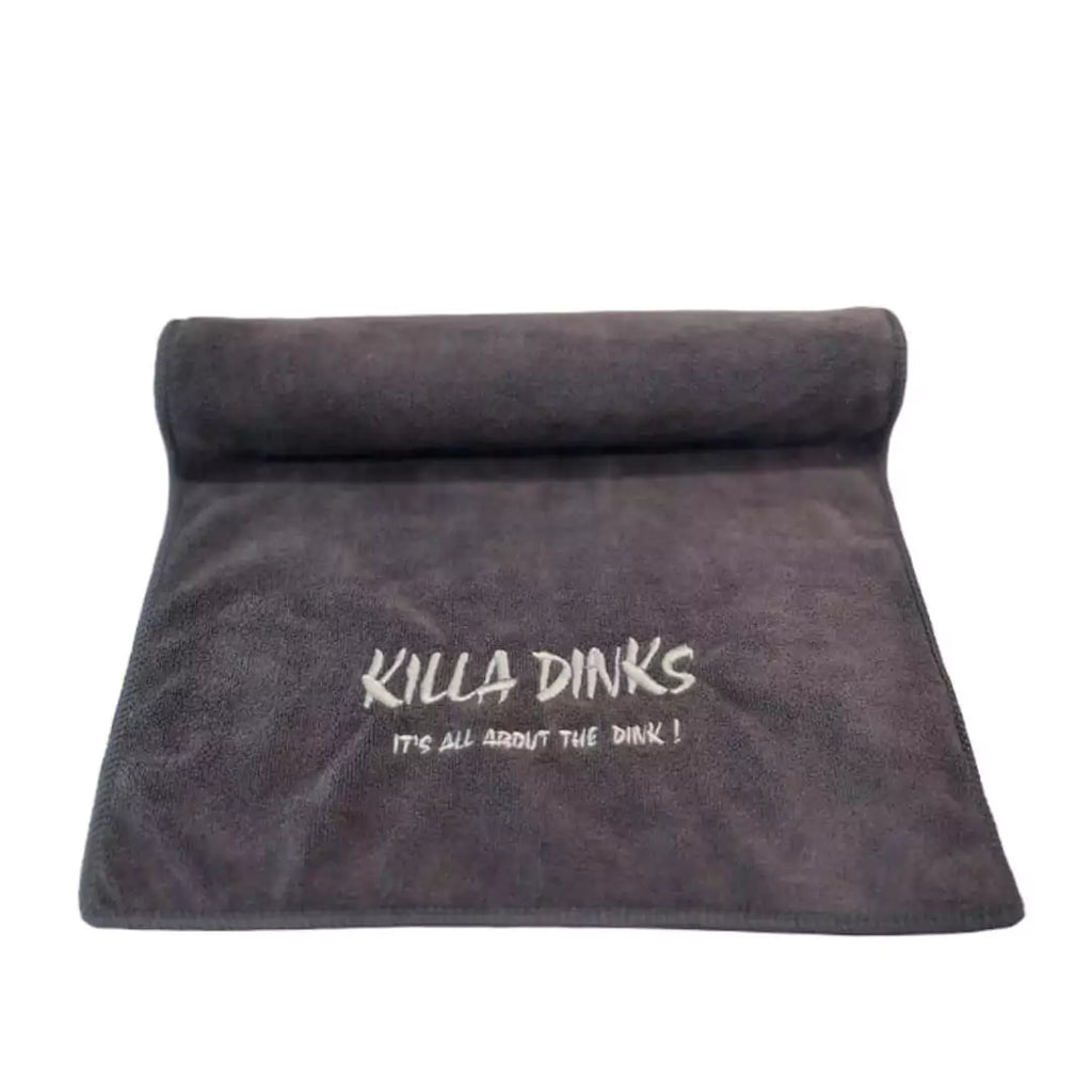 A gray  Killa Dinks Sweat Towel, available from iamRacketSports.com, Miami store.