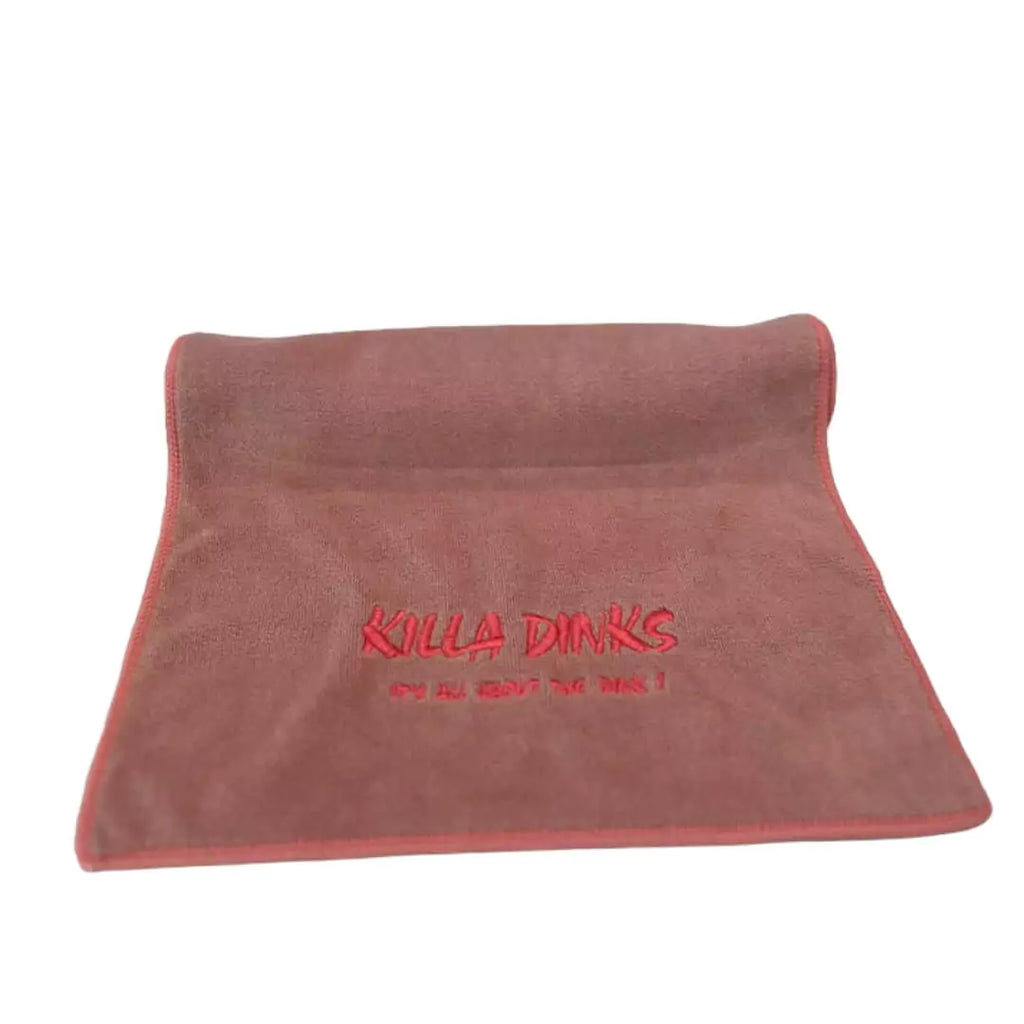 A pink  Killa Dinks Sweat Towel, Shop for at iam-Pickleball.com.