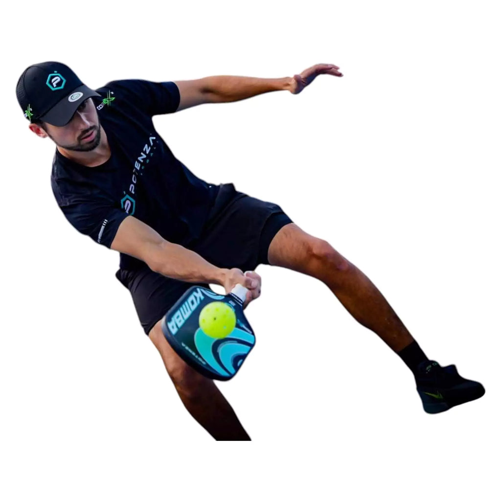 A player using a Potenza KOMBA+CORE*2 Pickleball Paddle, available at iamracketsports.com.