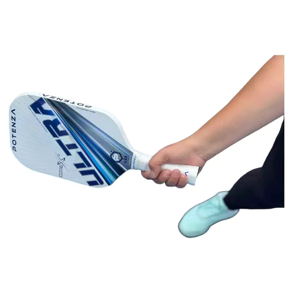 A player using a  Potenza ULTRA+ CORE*2 Elongagted Pickleball Paddle. Shop for Potenza at iam-Pickleball.com.