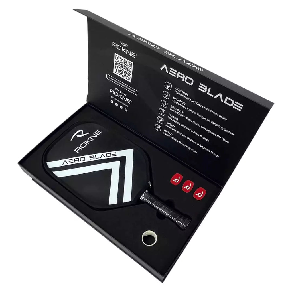 SPORT: PICKLEBALL. A Rokne 2024 AERO BLADE 1.19 Pickleball Paddle, in presentation box. Shop Rokne Paddles at "iamracketsports.com".