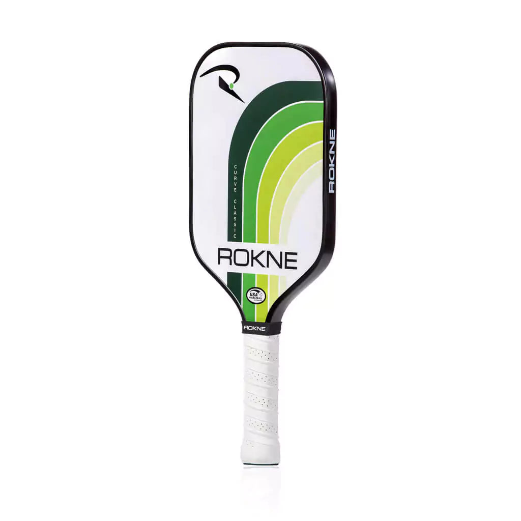 SPORT: PICKLEBALL. Shop Pickleball Paddles and Rackets at "iam-Pickleball.com" a division of "iamracketsports.com". Racket model is a 2023 Rokne Curve Classic LIMEADE Pickleball Paddle/racket for beginner and intermediate players. Racquet/Paleta is in side vertical orientation.