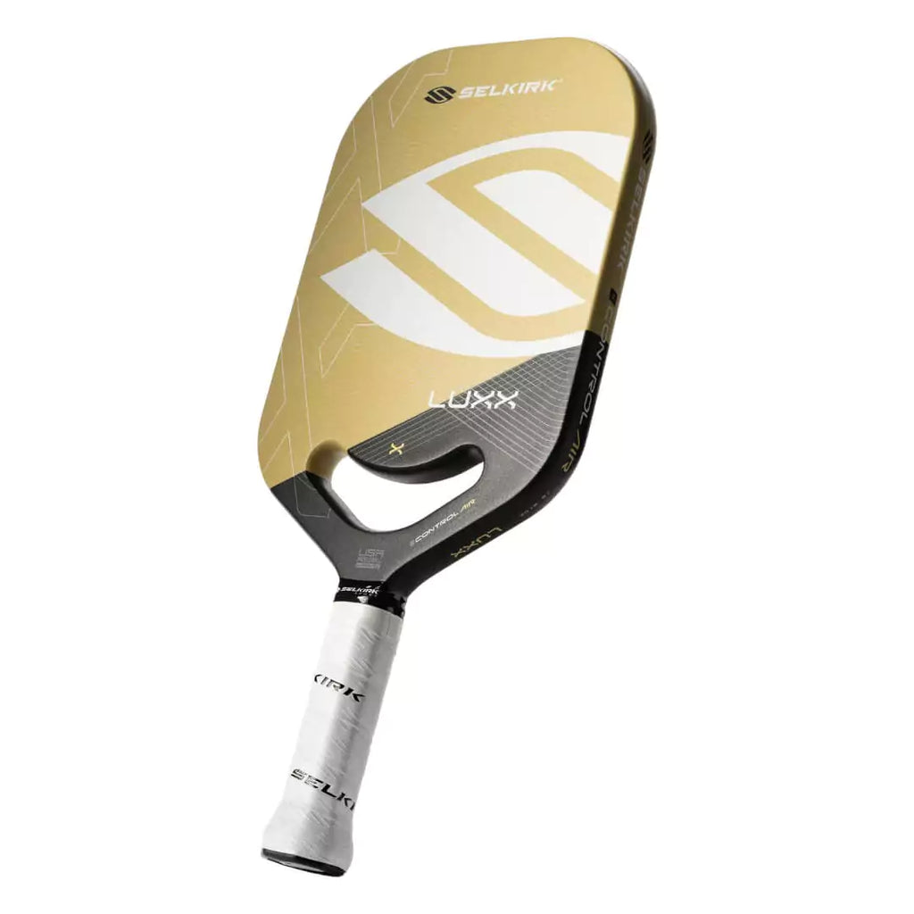 SPORT:PICKLEBALL. Vertical tilted back face, edge on profile of Gold Selkirk LUXX CONTROL AIR INVIKTA Pickleball Paddle. Endorsed by Jack Sock,  features Thikset Honeycomb core, Florek Carbon  Surface, 20 mmm thick,  grip length 4.25, grip size 4.25", edgeless Aero-DuraEdge frame.