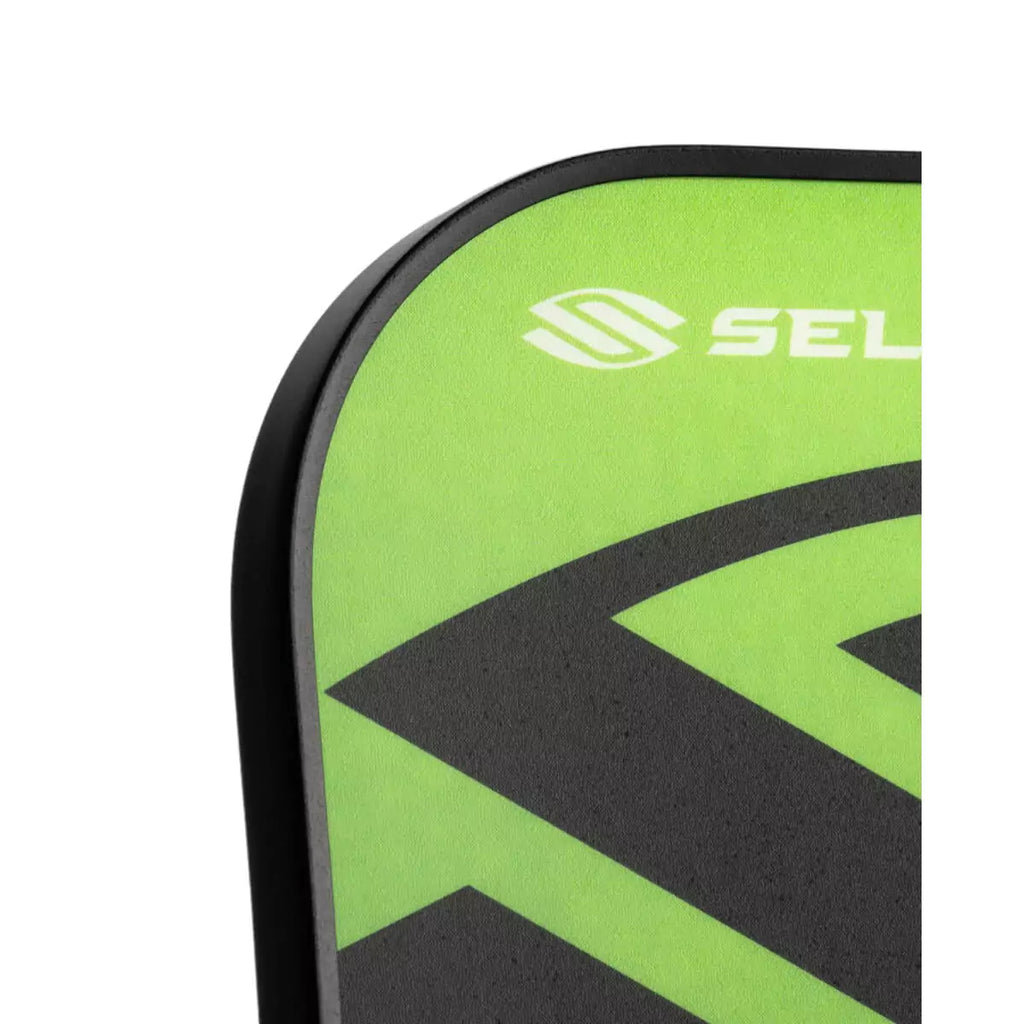 A partial view of a green 
Selkirk AMPED Control S2 16mm Pickleball Paddle,
FiberFlex + Fiberglass surface with 
a durable spin coating and X5 Honeycomb core.
Available from iamPickleball.store.