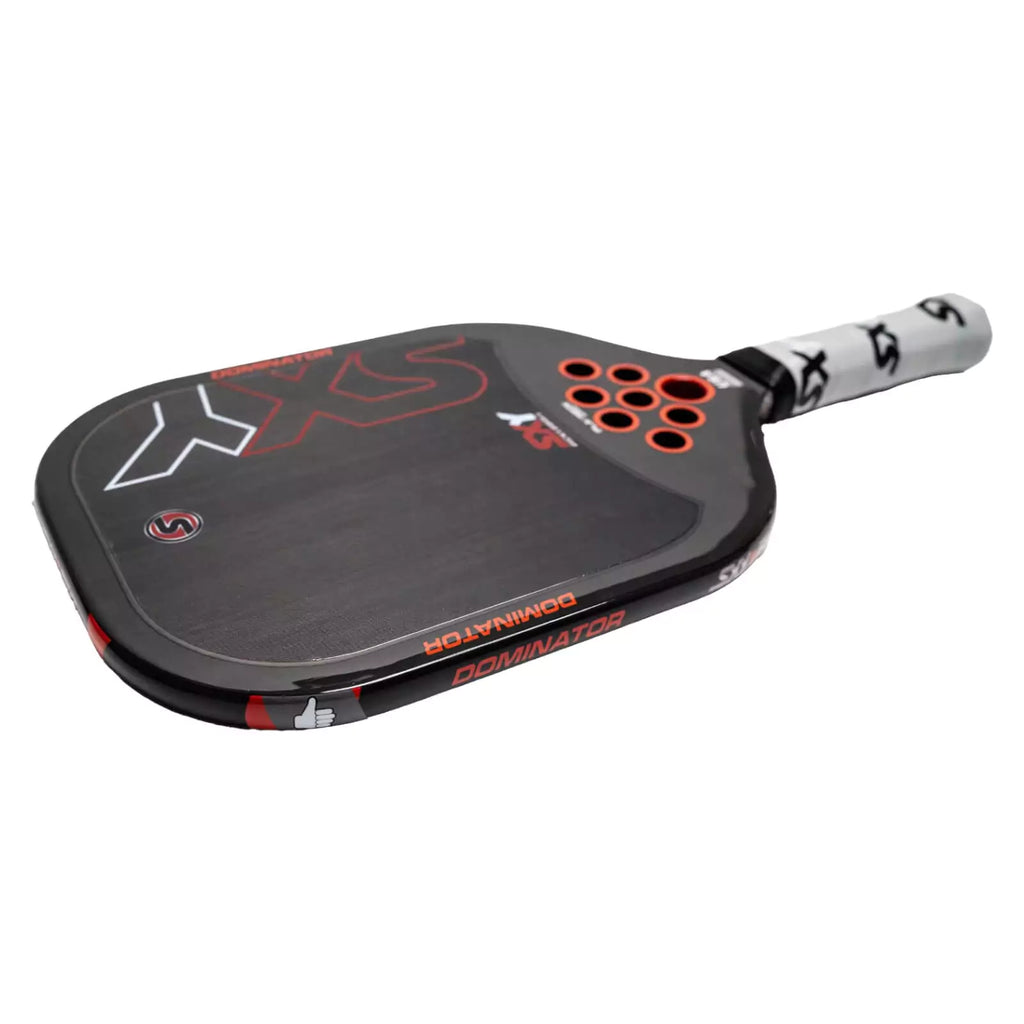 A horizontal  SXY PKL DOMINATOR Pickleball Paddle, available from iambeachtennis.com.