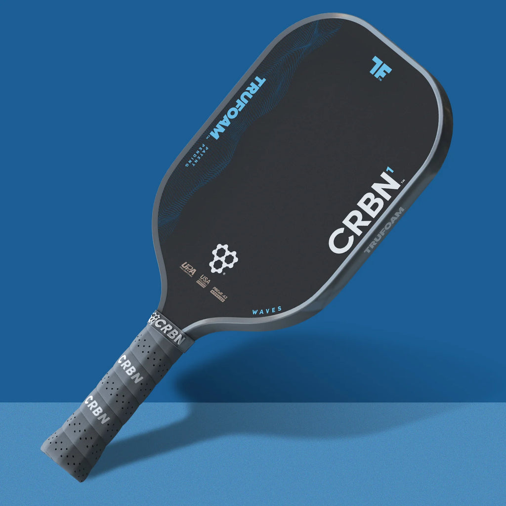 A CRBN¹ TruFoam WAVES ELONGATED LONG HANDLE Pickleball Paddle,
available from IamRacketsports.com, online and in-store, Miami USA.