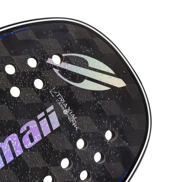 The paddle face of a Mormaii TRIAX 24K 2024 Professional Beach Tennis Paddle,
available from at iamBeachTennis.com.