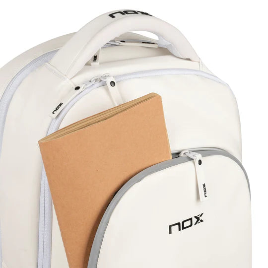 A Nox PRO White Series Backpack, with open front compartment, available from iamRacketSports.com, online and in store.