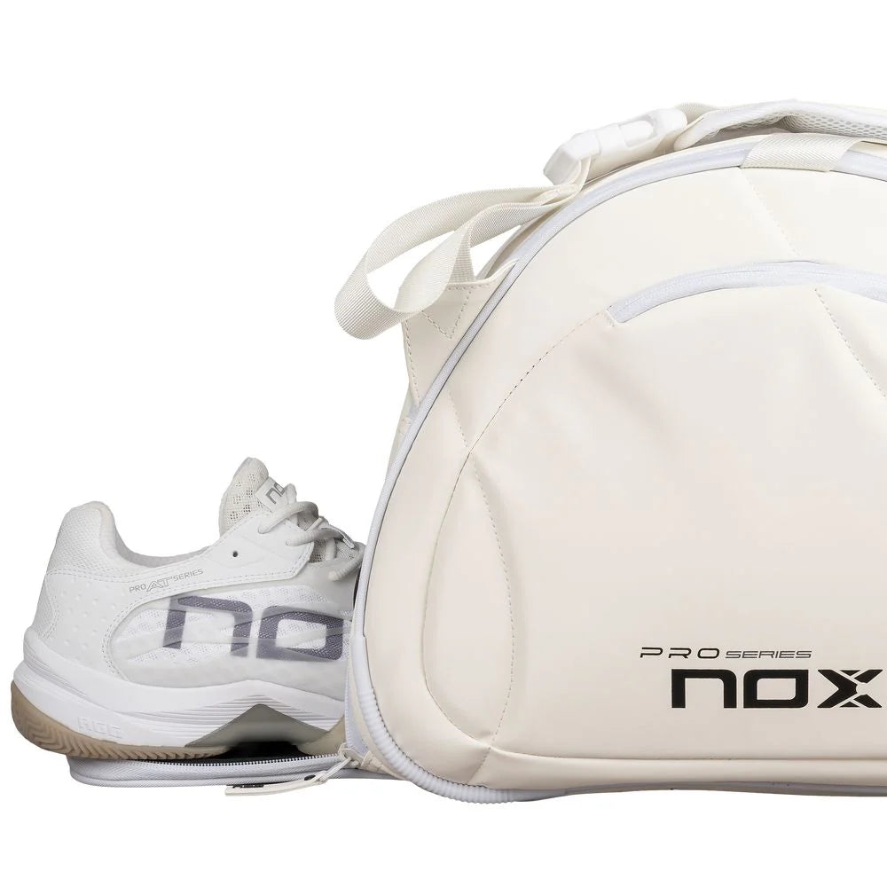A Nox PRO Series White Racket Bag with open shoe compartment, available from iamRacketSports.com, in store and online.