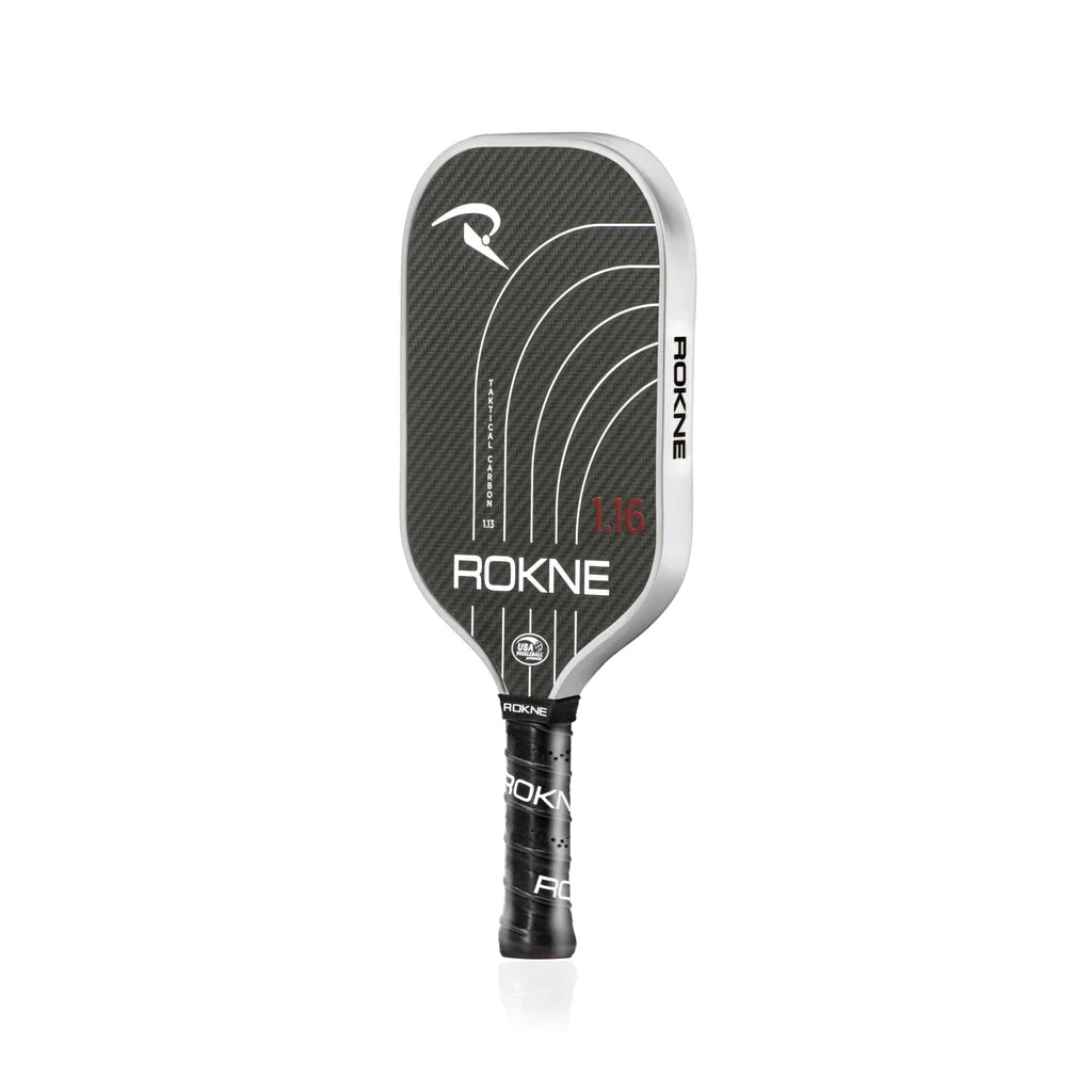 SPORT: PICKLEBALL. Shop Rokne Pickleball Paddles and Rackets at "iam-Pickleball.com" a division of "iamracketsports.com". Racket model is a 2023 Rokne TAKTICAL CARBON 1.16 (16mm) Pickleball Paddle/racket for beginner to advanced/professional players. Racquet/Paleta is in side vertical orientation. Front of Paddle.