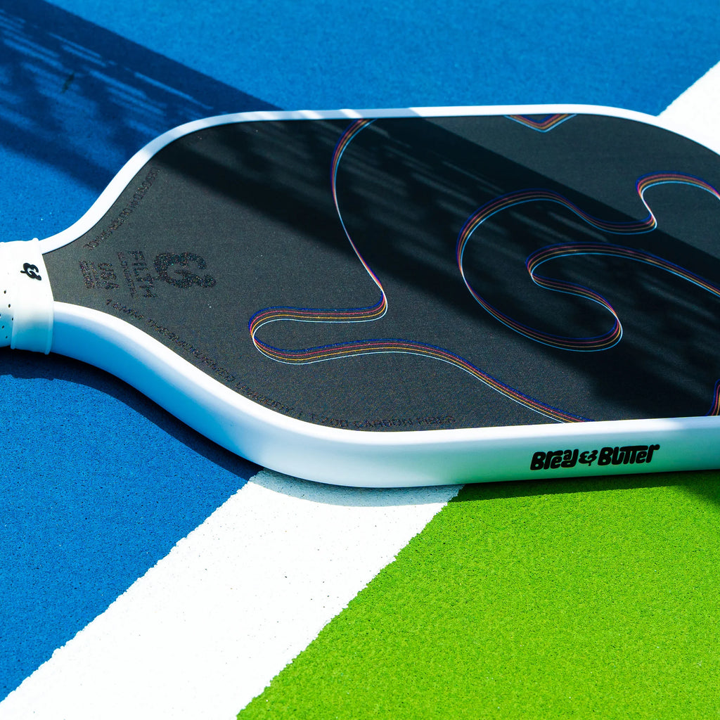 A white Bread & Butter Fifth 16mm 2024 Elongated Pickleball Paddle, available at iampickleball.store, Miami shop.