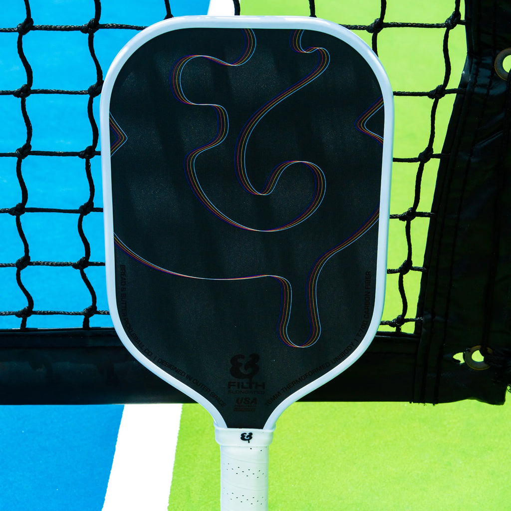 A white Bread & Butter filth 16mm 2024 Elongated Pickleball Paddle, available at iamracketsports.com.