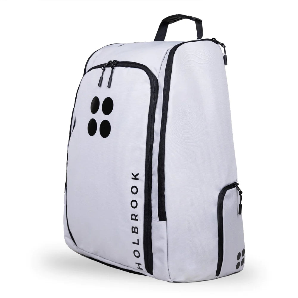  SPORT:PICKLEBALL. Shop Holbrook Pickleball at "iamracketsports.com" Miami's pickleball center.  A Holbrook pickleball Podium paddle/racket bag in white with black zips. Showing left rotated view of bag face and right side .