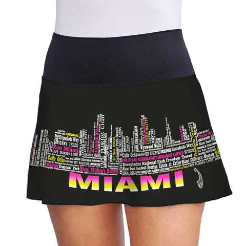 SPORT:PICKLEBALL. Shop Lacoa Sports clothing at "iamPickleball.Store" a division of "iamracketsports.com". Front view of Lacoa's black MIAMI SKYLINE Skirt, with design of Miami Skylines described in text and the city name  shown, using vibrant neon yellow, pink and white.