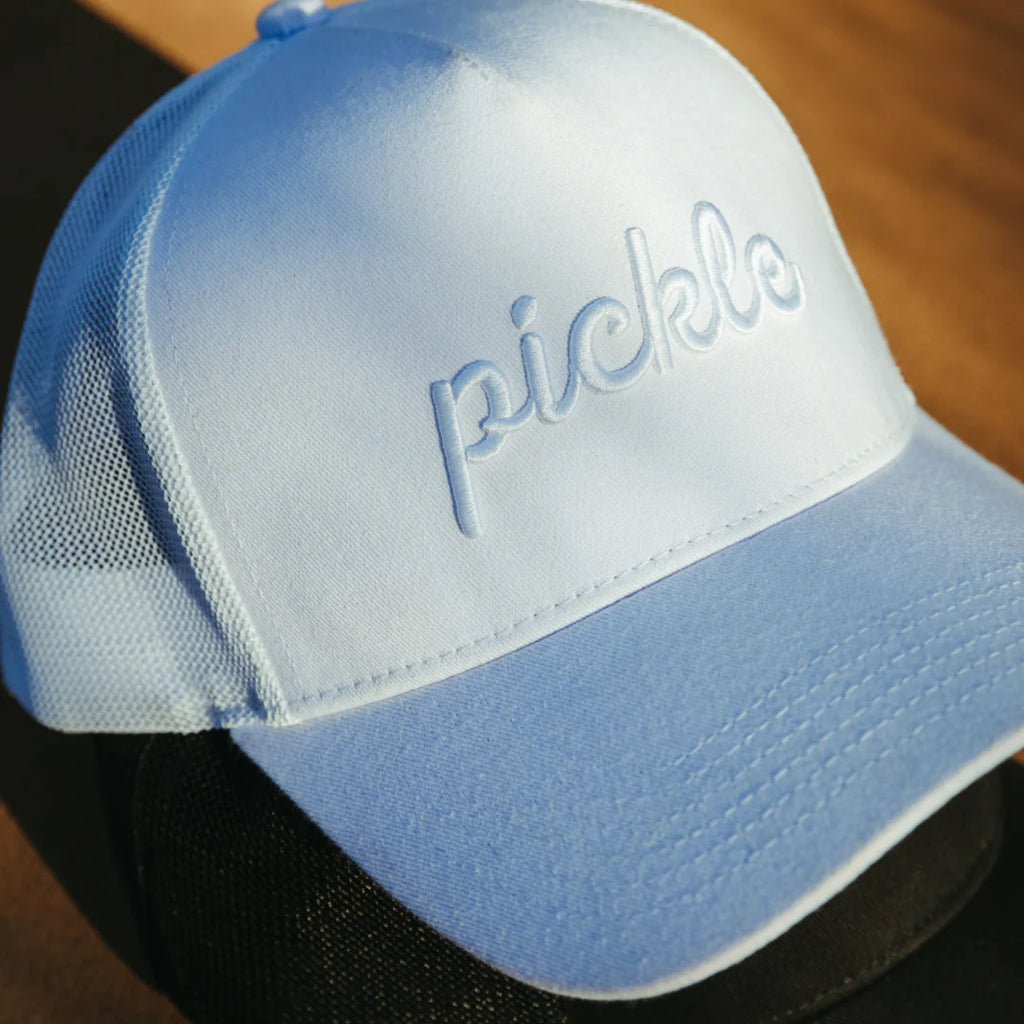 A white Pickle Brand SCRIPT TRUCKER Hat , shop for at iamRacketSports.com.