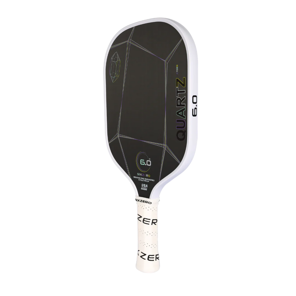 A white Six Zero QUARTZ 15mm PickleBall Paddle, purchase at "iam-pickleball.com".
