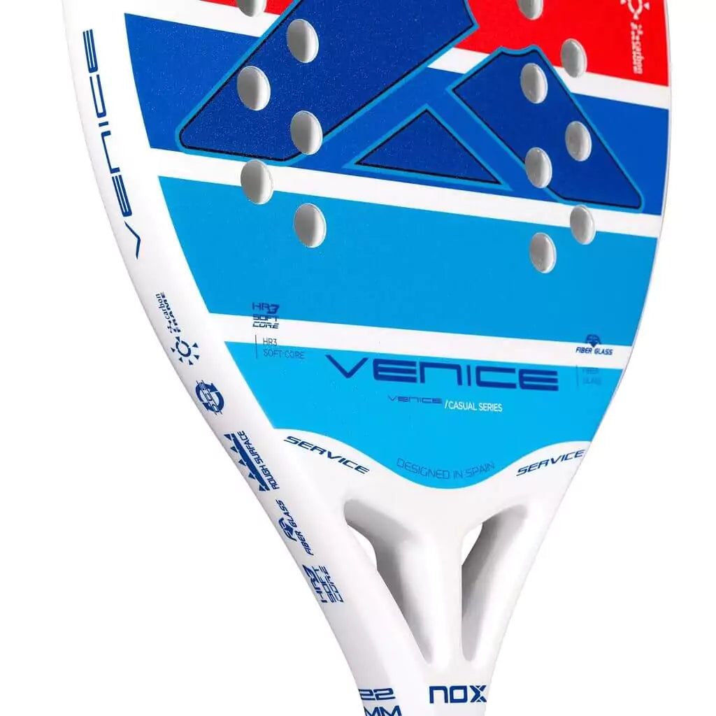 iambeachtennis BT Shop - Nox Beach Brand year 2022 BT paddle. The Racket model is a Nox Beach VENICE Beginner Beach Tennis racket - close up of the Racchetta / raquete face and neck.
