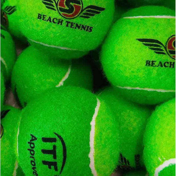 Shop Sexy Brand Beach Tennis at "iambeachtennis" an online store based out of Miami. Sexy Tropical S-Ball in Guava Green. Image shows close up of balls.