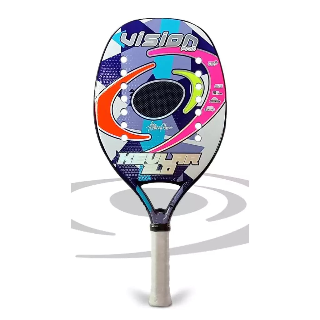 Shop Vision Beach Tennis Rackets, Paddles, Balls and Accessories at iambeachtennis, shipping worldwide. Miami based boutique depot store - Racket model shown is a 2023 Vision Pro Kevlar 3.0 Professional Beach Tennis Racket. Raquete is vertical.