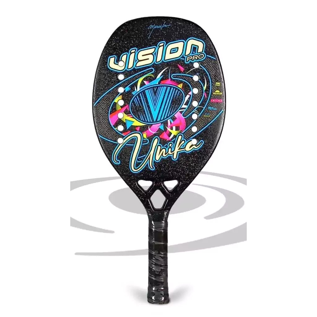 Shop Vision Beach Tennis Rackets, Paddles, Balls and Accessories at iambeachtennis, shipping worldwide. Miami based boutique depot store - Racket model shown is a 2023 Vision Pro UNIKA Professional Beach Tennis Racket. Raquete is vertical.