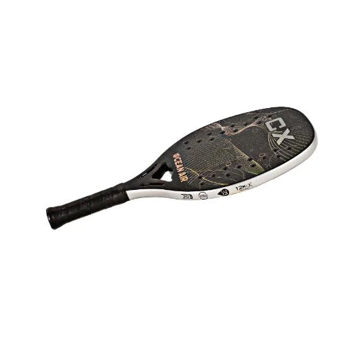 Shop i am Beach Tennis - Ocean Air Beach Tennis Paddle, year 2023. The racquet model is a Oceanair 2023 CX Advanced/Professional beach tennis racket / raquete. Flat horizonal view of the racket / raquet.