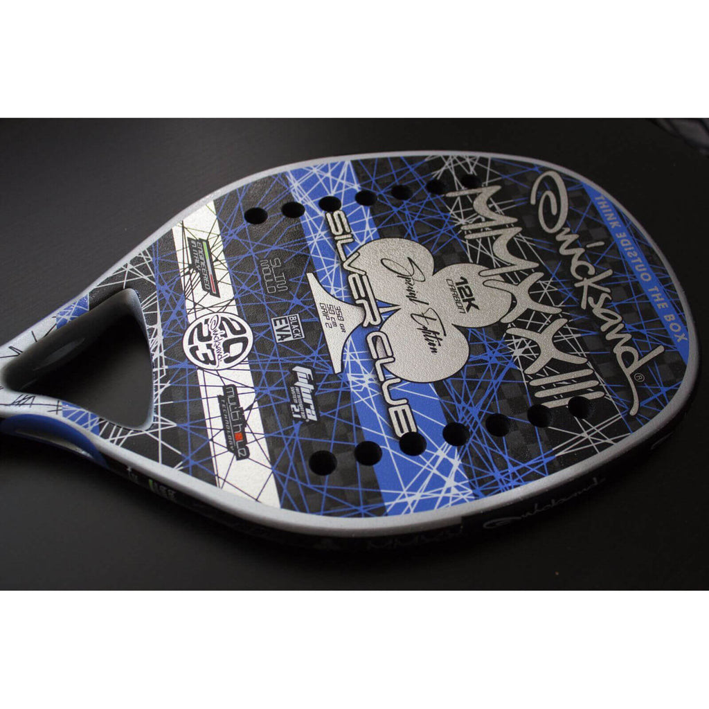 iambeachtennis a miami based store/shop presents - Quicksand Beach Tennis Brand - Racket model is Quicksand SILVER CLUB LIMITED EDITION 2023 an advanced/professional beach tennis racket/racchetta. Raquet/Raquete laying flat, horizontaly.